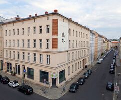 Exterior view of the Mori Ogai Center in Berlin featuring the calligraphy  "Ogai"